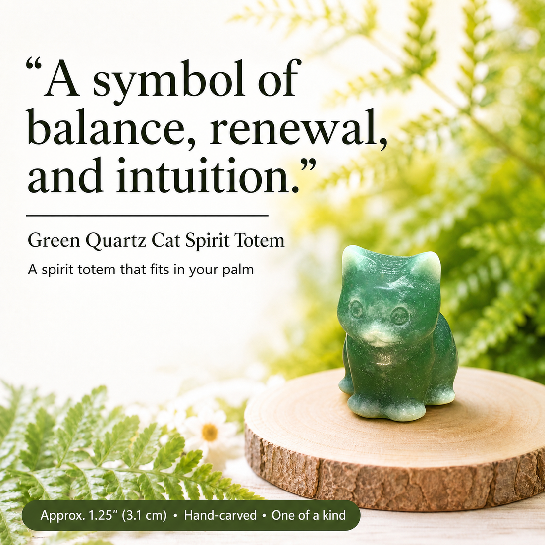 A small carved green quartz cat sitting on a wooden slice among ferns and daisies