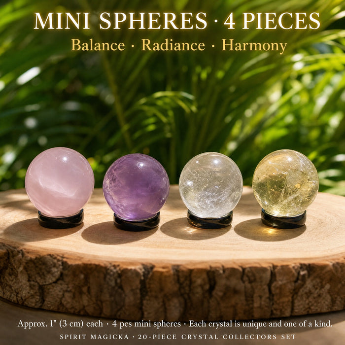 Four polished mini spheres in a row: rose quartz, amethyst, clear quartz and citrine