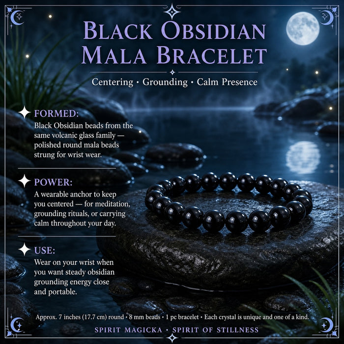 Black obsidian round bead bracelet resting on a stone