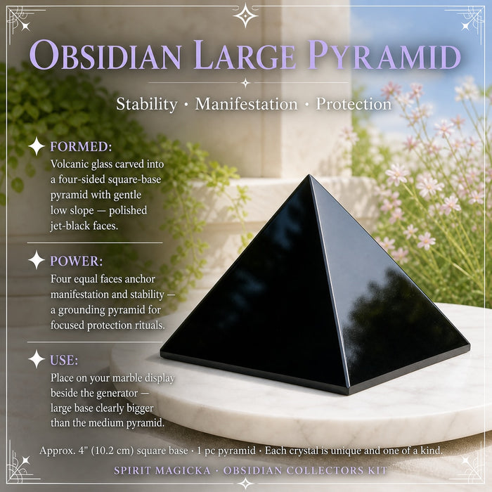 Large four-sided obsidian pyramid with polished faces on a white marble platter
