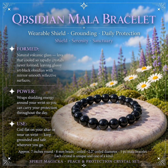 Bracelet of round polished black obsidian beads lying on a round stone