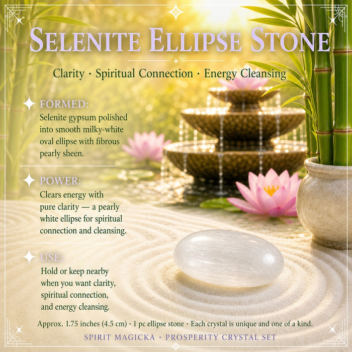 Pearly white selenite ellipse stone on raked sand