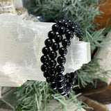 Bracelet Mala en obsidienne noire avec pochette en velours