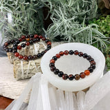 Bracelet Mala en agate à rayures noires avec pochette en velours