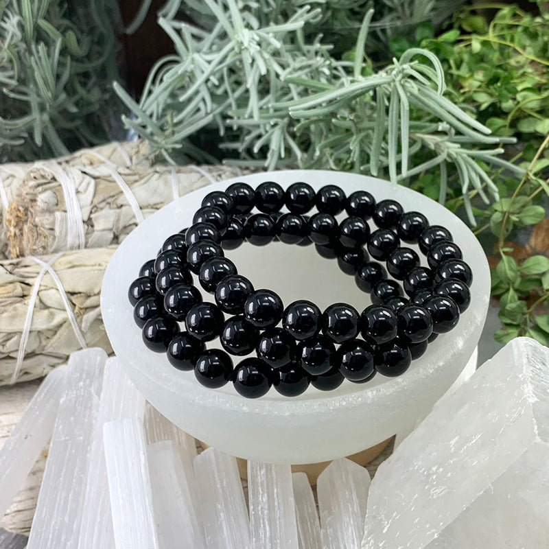 Bracelet Mala en obsidienne noire avec pochette en velours